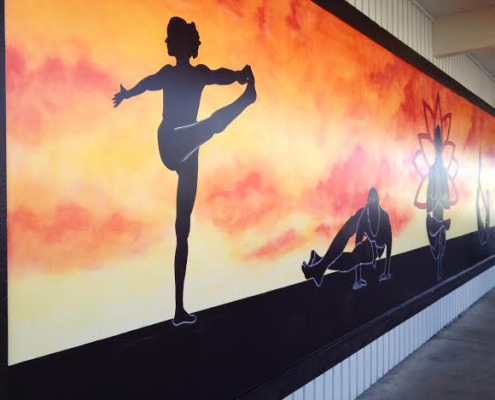 murals trompe l'oeil doorways and views Graphic Silhouette Hot Yoga Mural At The Ashram Studio in Kirkland sunset yoga postures mural artist murals Tacoma