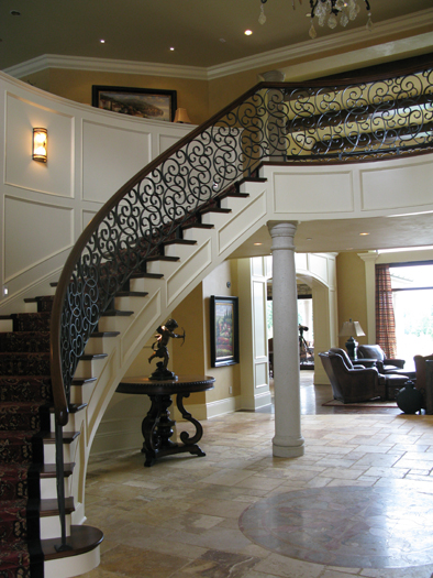 venetian plaster italian plasters French Chateau Plaster Entryway Bellevue interior design decorative finishes Seattle spiral staircase travertine floors